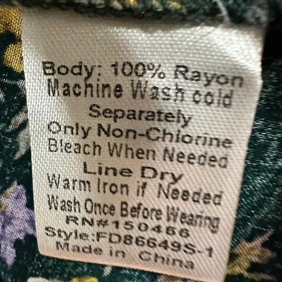 LADIES DARK GREEN TOP WITH YELLOW & PURPLE FLOWERS - Picture 2 of 2